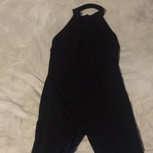 High-neck, open-back black romper